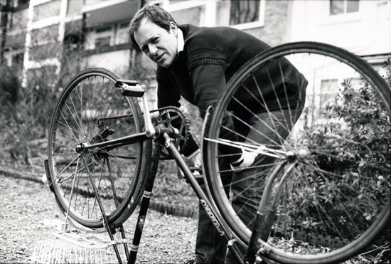 Miles mending his Bike